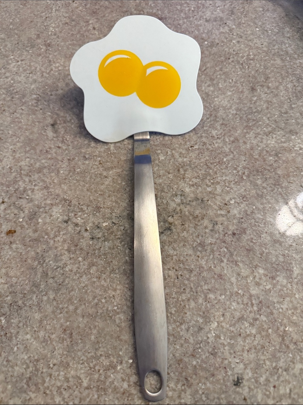 Crate&Barrel Stainless Spatula with Sunny Yellow Egg Graphic
